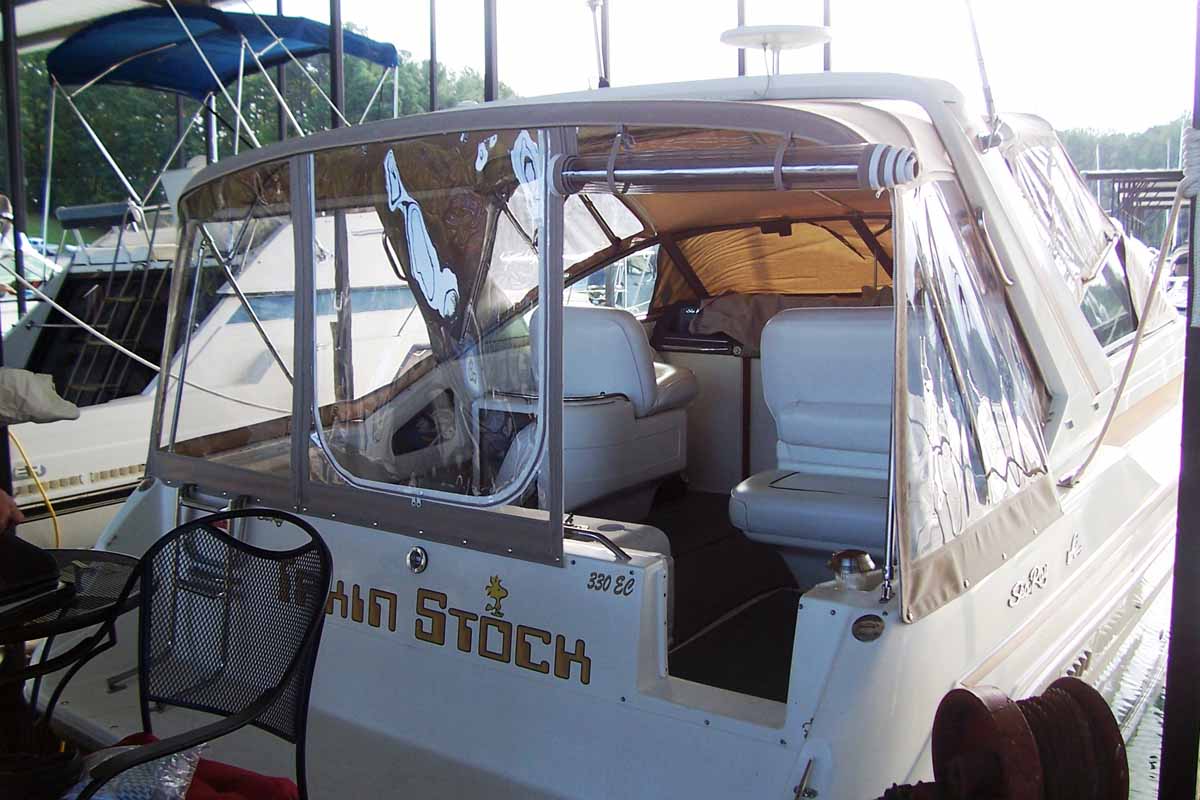 Camper back zipping to front bimini under the arch