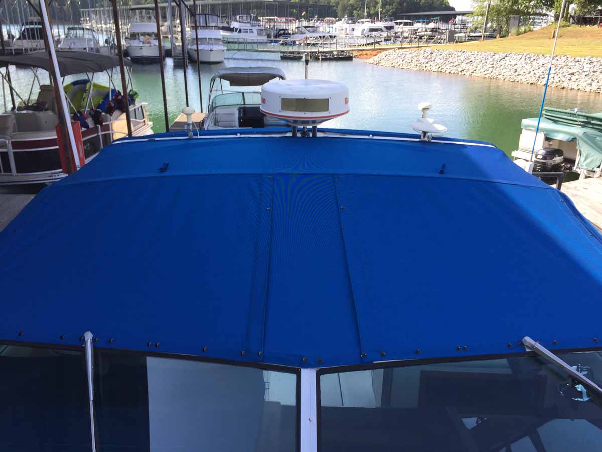 Custom bimini top against the sky